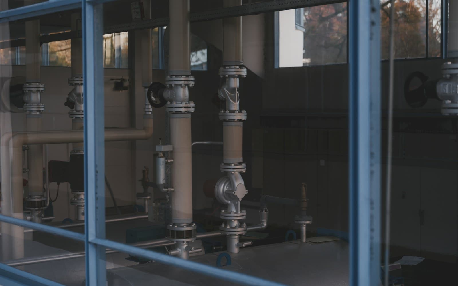 Industrial pipework and pumps inside a process-heating facility
